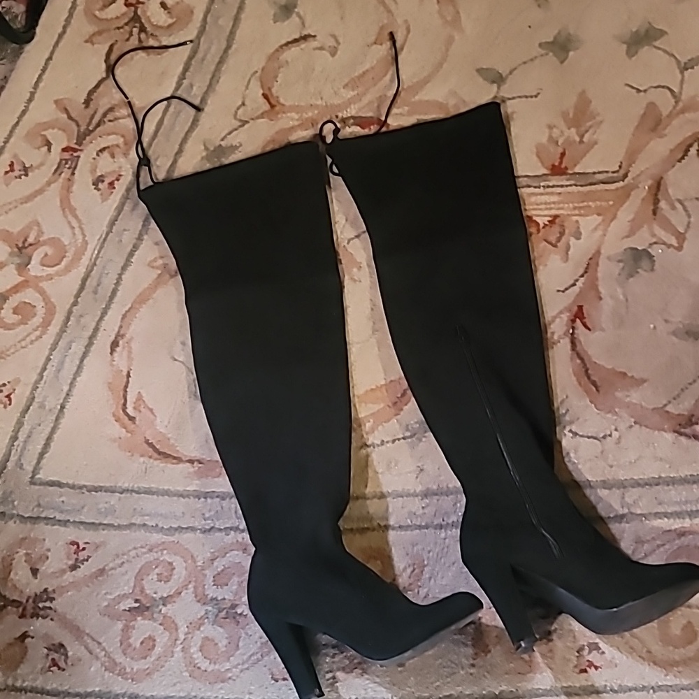 Over the knee, high-heeled boots, black.  Size 8 side zipper, lace tie in back.